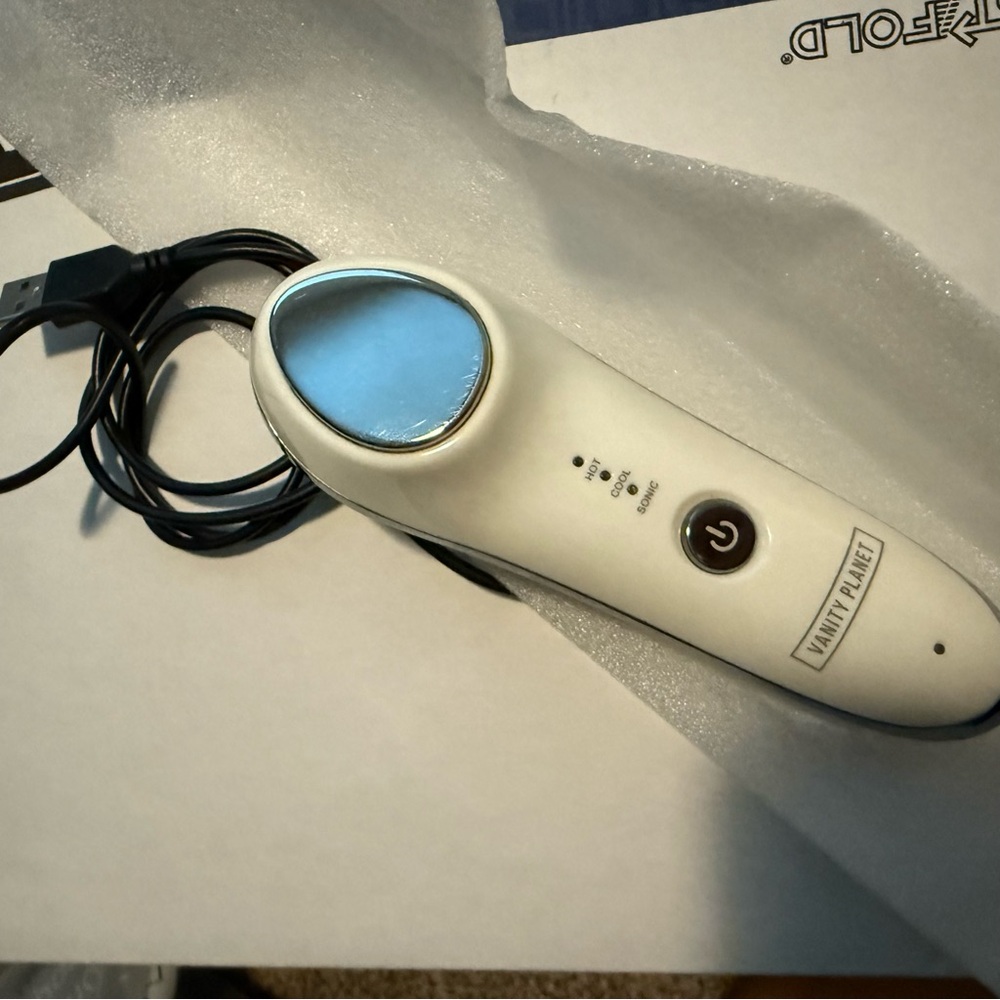 Forever Young Vanity Planet hot cold rejuvenating facial anti aging sonic wand